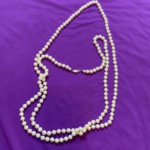 Faux white pearl necklace really long, looks real